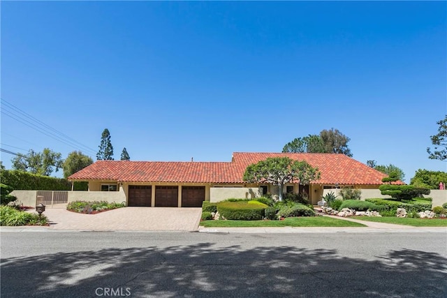 view of front of home featuring a garage