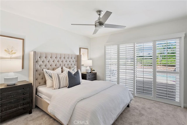 bedroom with light colored carpet and ceiling fan