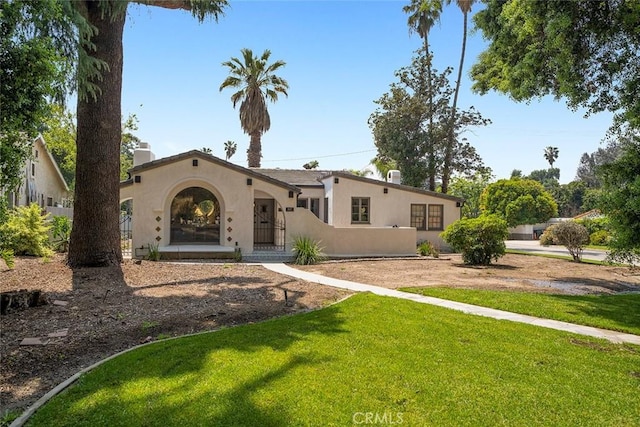 view of front of house with a front yard