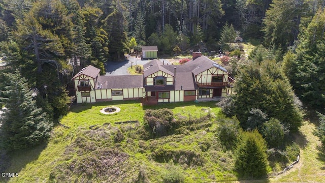 aerial view featuring a view of trees