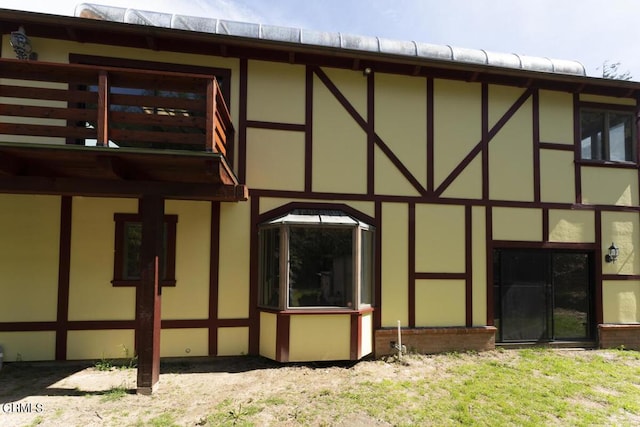 exterior space featuring stucco siding