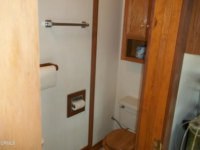bathroom featuring toilet