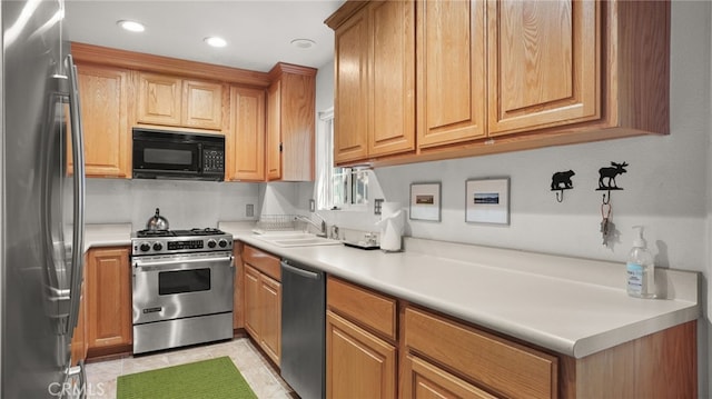 kitchen with sink and stainless steel appliances