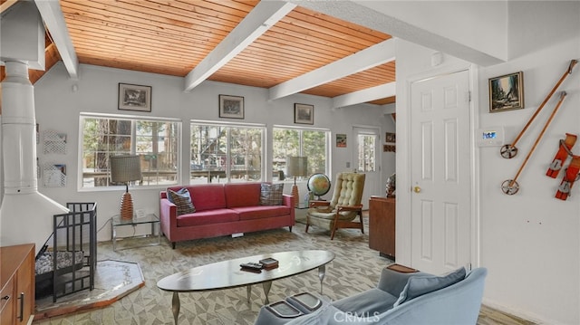 living room featuring beam ceiling and wooden ceiling