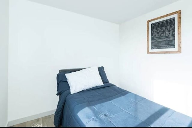 bedroom featuring hardwood / wood-style floors