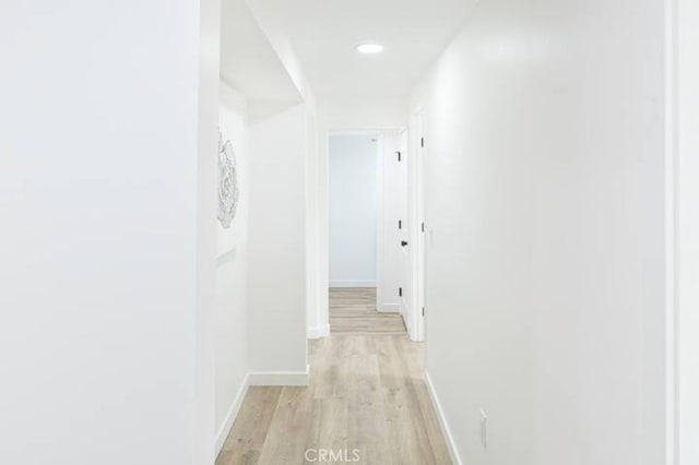 hallway featuring light hardwood / wood-style flooring