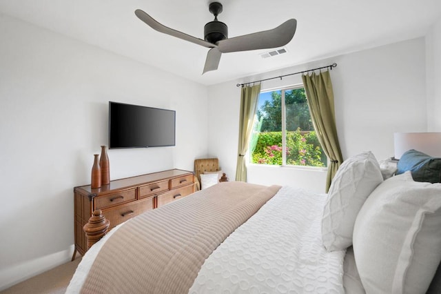 bedroom featuring ceiling fan and carpet flooring