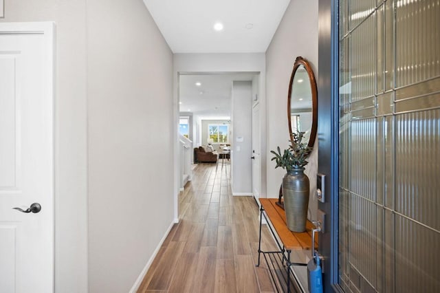 corridor featuring hardwood / wood-style flooring