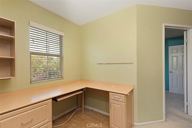 unfurnished office with built in desk