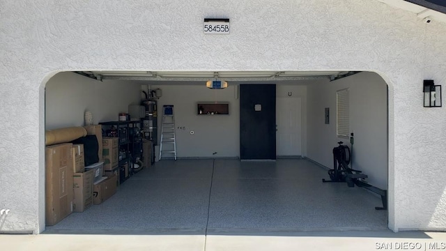 garage featuring a garage door opener