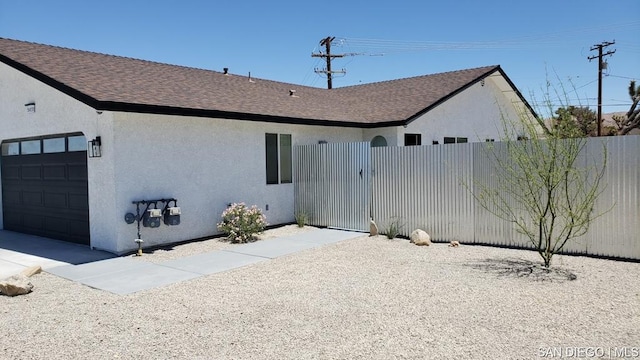 exterior space with a garage