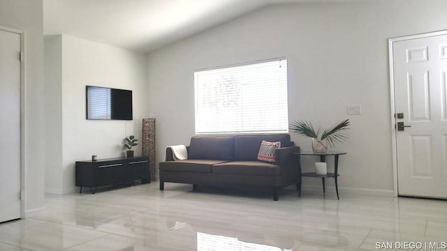 living room with lofted ceiling