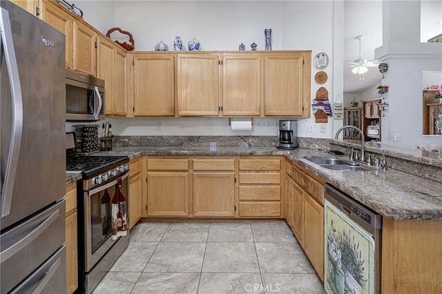 14329 Stone Creek Trl, Hesperia, CA 92344 - kitchen featuring kitchen peninsula, appliances with stainless steel finishes, ceiling fan, sink, and light tile floors