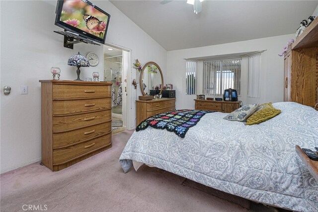 14329 Stone Creek Trl, Hesperia, CA 92344 - carpeted bedroom with ceiling fan, vaulted ceiling, and ensuite bathroom
