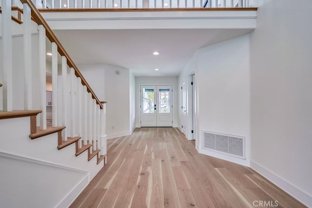 entryway with light wood-type flooring