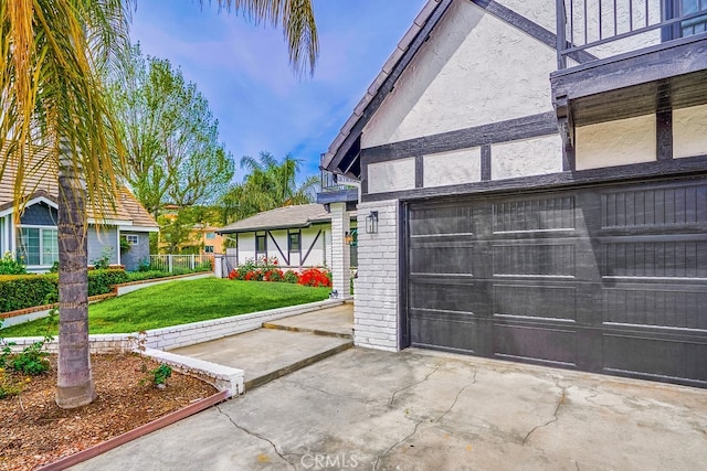 garage featuring a yard