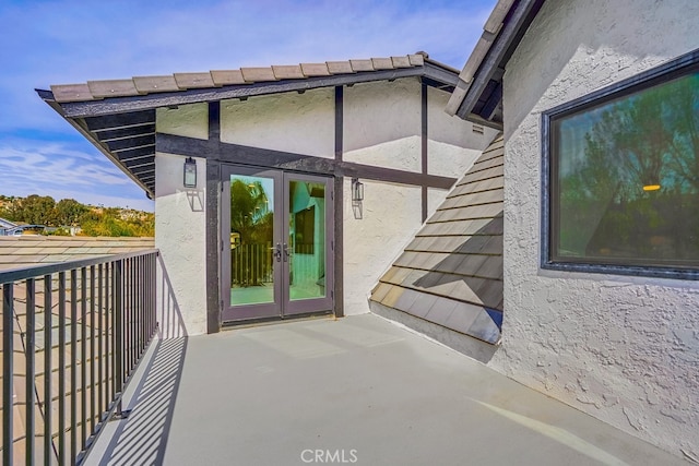 doorway to property featuring french doors and a patio