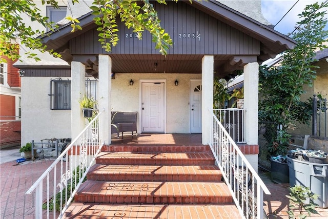 property entrance with a porch