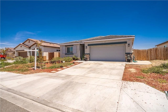 ranch-style house featuring a garage