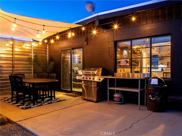 view of patio with a grill