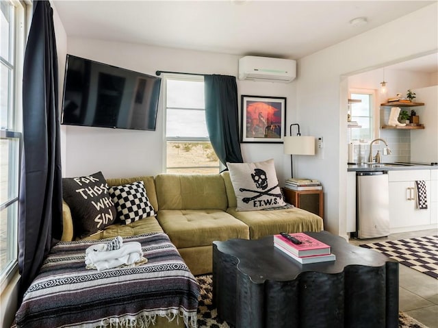 living room featuring sink, a wall mounted air conditioner, and tile patterned flooring