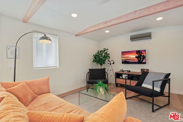 living room featuring vaulted ceiling with beams, light wood-type flooring, and a wall unit AC