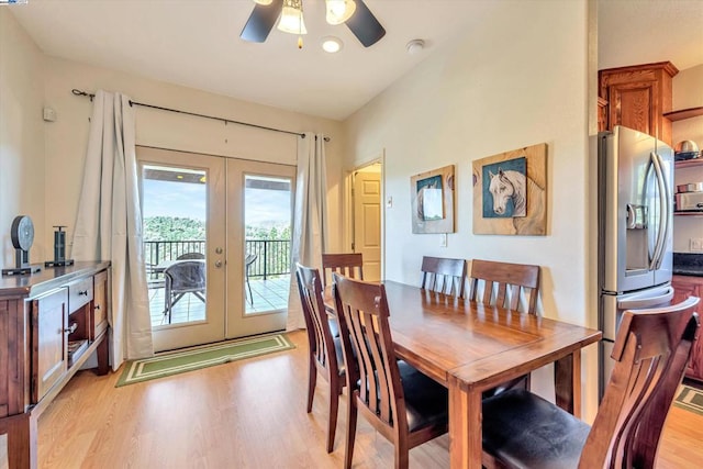 dining room featuring light hardwood / wood-style flooring, french doors, and ceiling fan