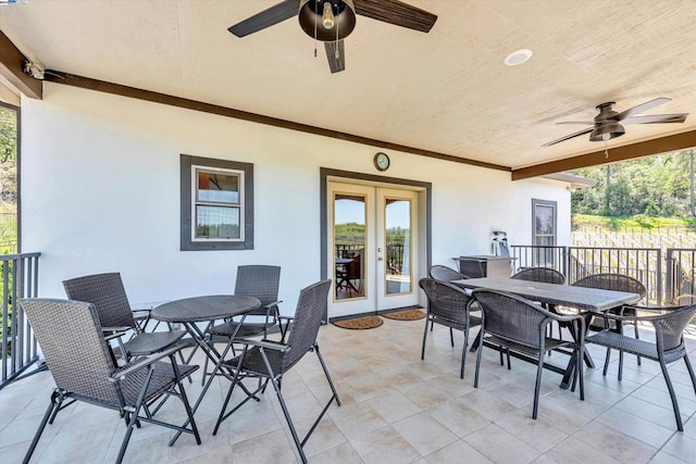 view of patio / terrace featuring french doors and ceiling fan