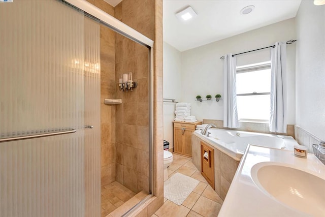 full bathroom with toilet, tile patterned floors, independent shower and bath, and sink