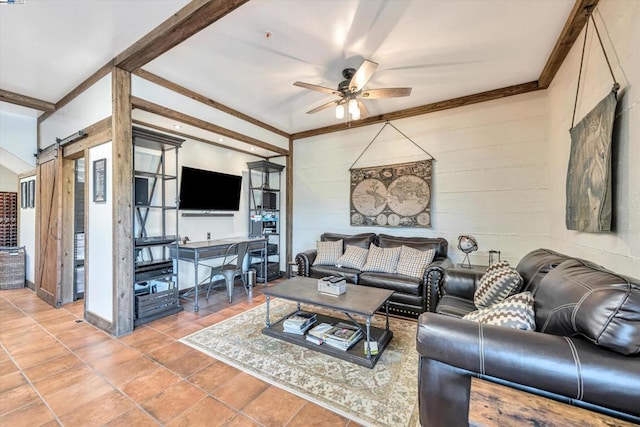 tiled living room featuring crown molding, a barn door, and ceiling fan