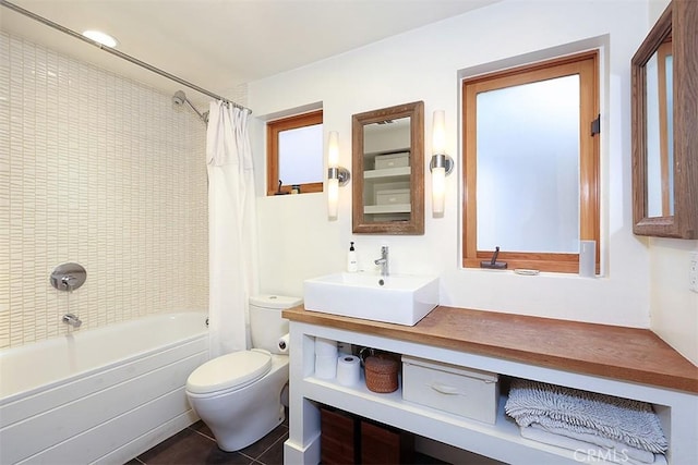 667 Glenneyre St, Laguna Beach, CA 92651 - full bathroom with tile patterned floors, toilet, vanity, and shower / bathtub combination with curtain