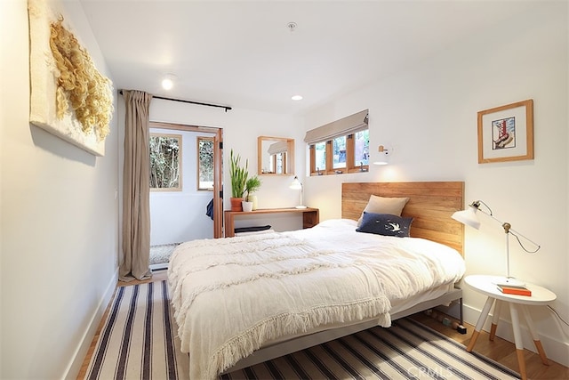 bedroom featuring hardwood / wood-style flooring