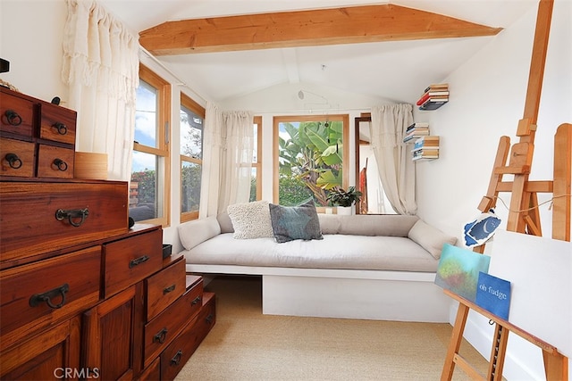 living area with carpet and vaulted ceiling with beams