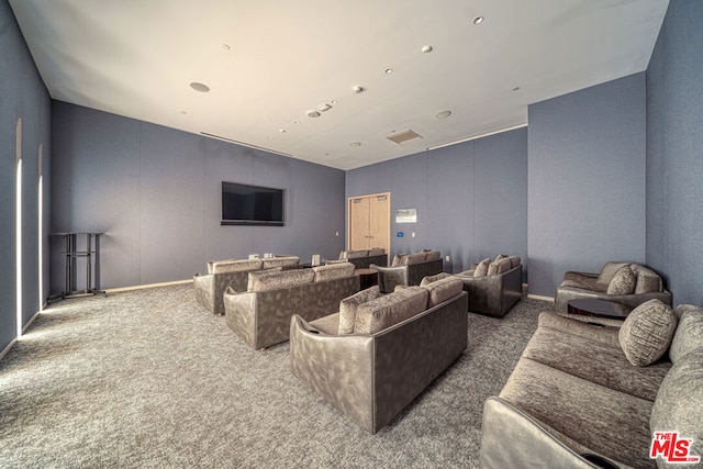 home theater room with carpet floors