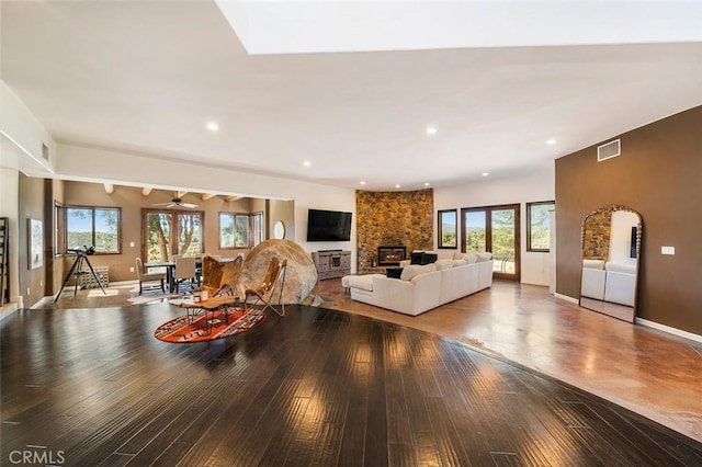 dining space with ceiling fan and hardwood / wood-style floors