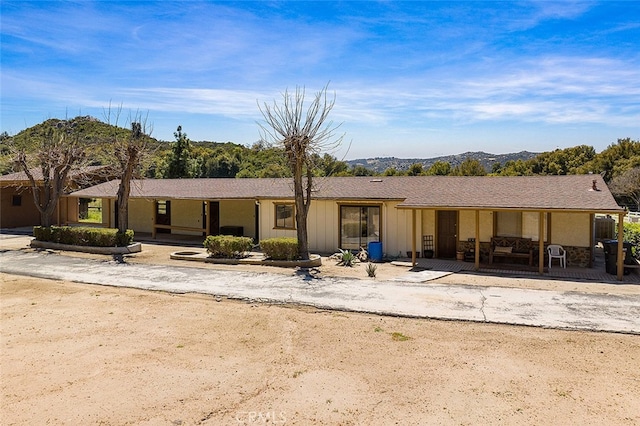 view of front of house with a mountain view