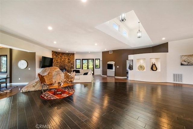 living room featuring hardwood / wood-style flooring and a fireplace