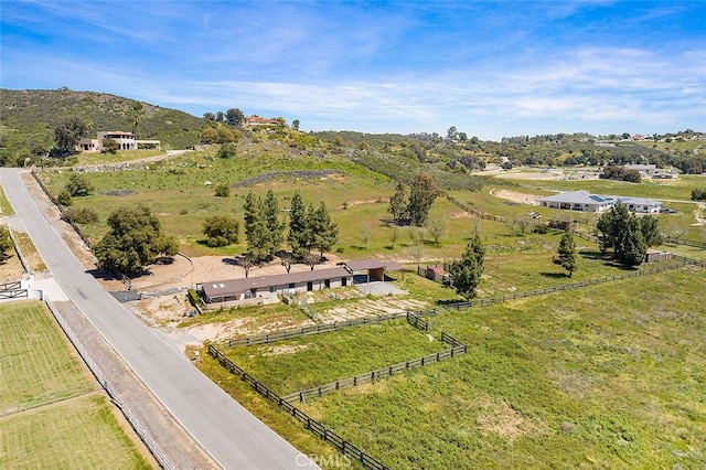 birds eye view of property featuring a rural view