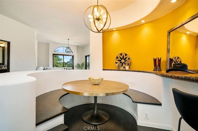 dining area featuring a chandelier