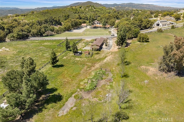 birds eye view of property with a mountain view