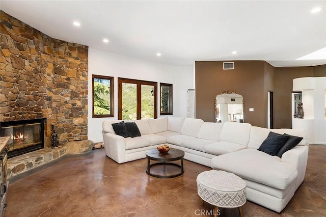 living room featuring a fireplace