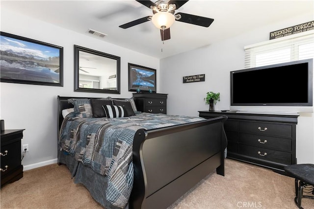 bedroom featuring ceiling fan and light colored carpet