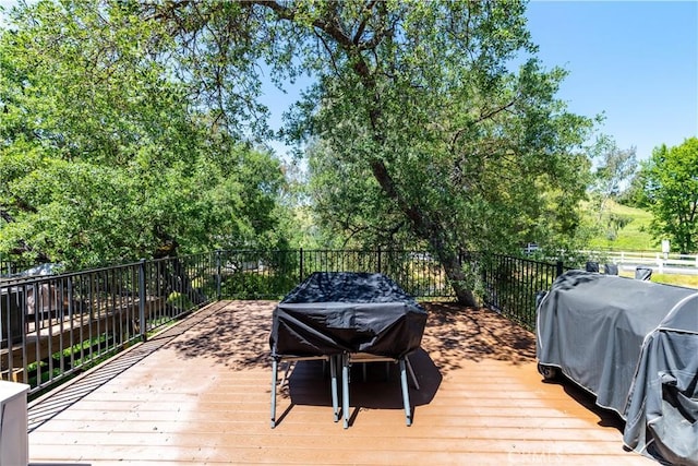 wooden deck with area for grilling