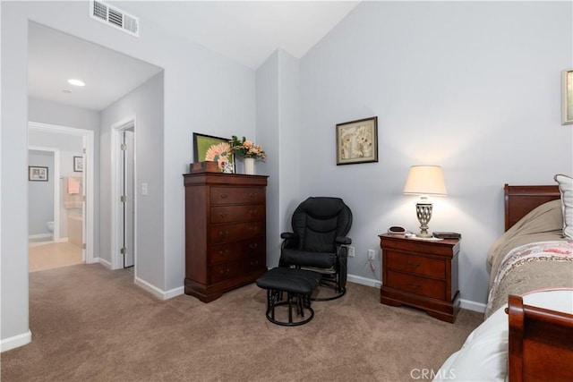 carpeted bedroom with vaulted ceiling