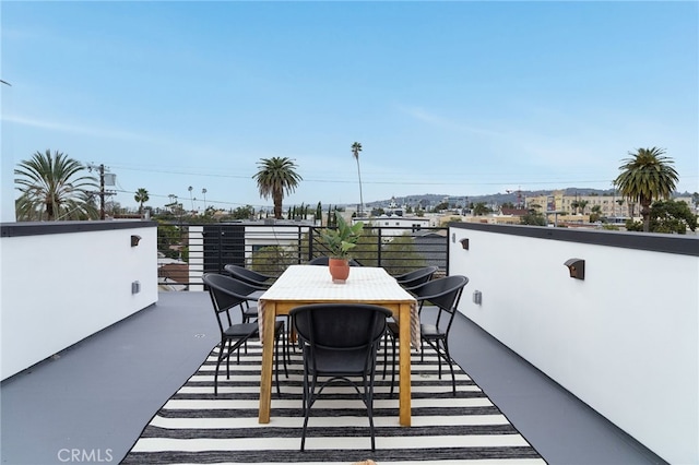 view of patio featuring a balcony