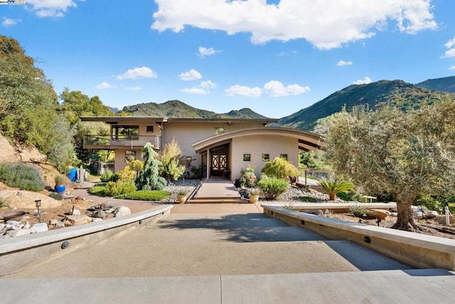 view of front facade with a mountain view