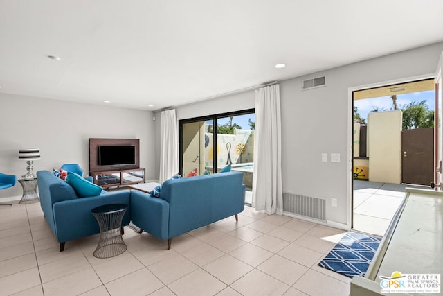 living room with light tile patterned flooring