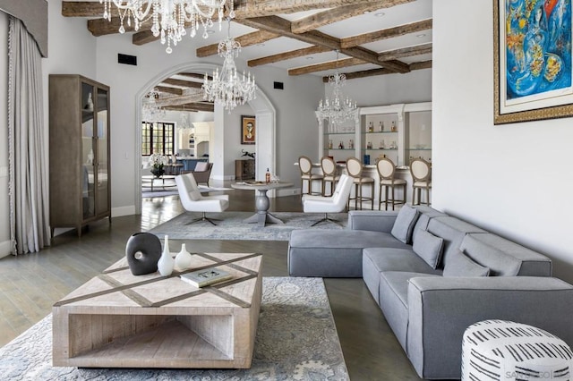 living room with beamed ceiling and hardwood / wood-style flooring