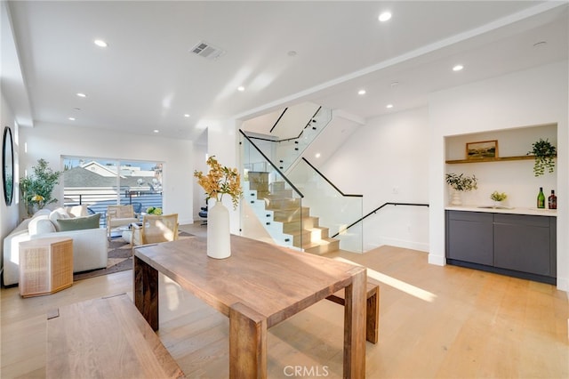 dining room with light hardwood / wood-style floors