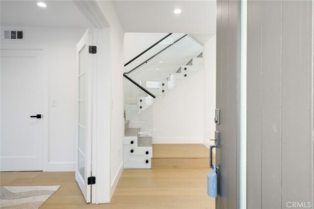 hall featuring light hardwood / wood-style flooring